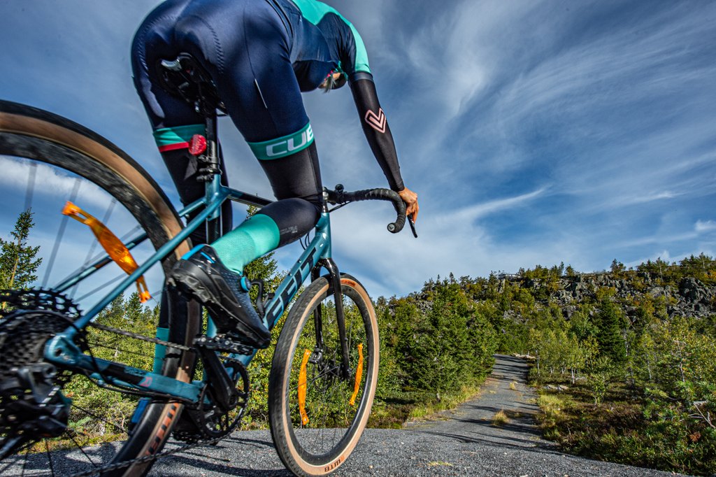 Close-up view of a gravel cyclist riding in Ruka